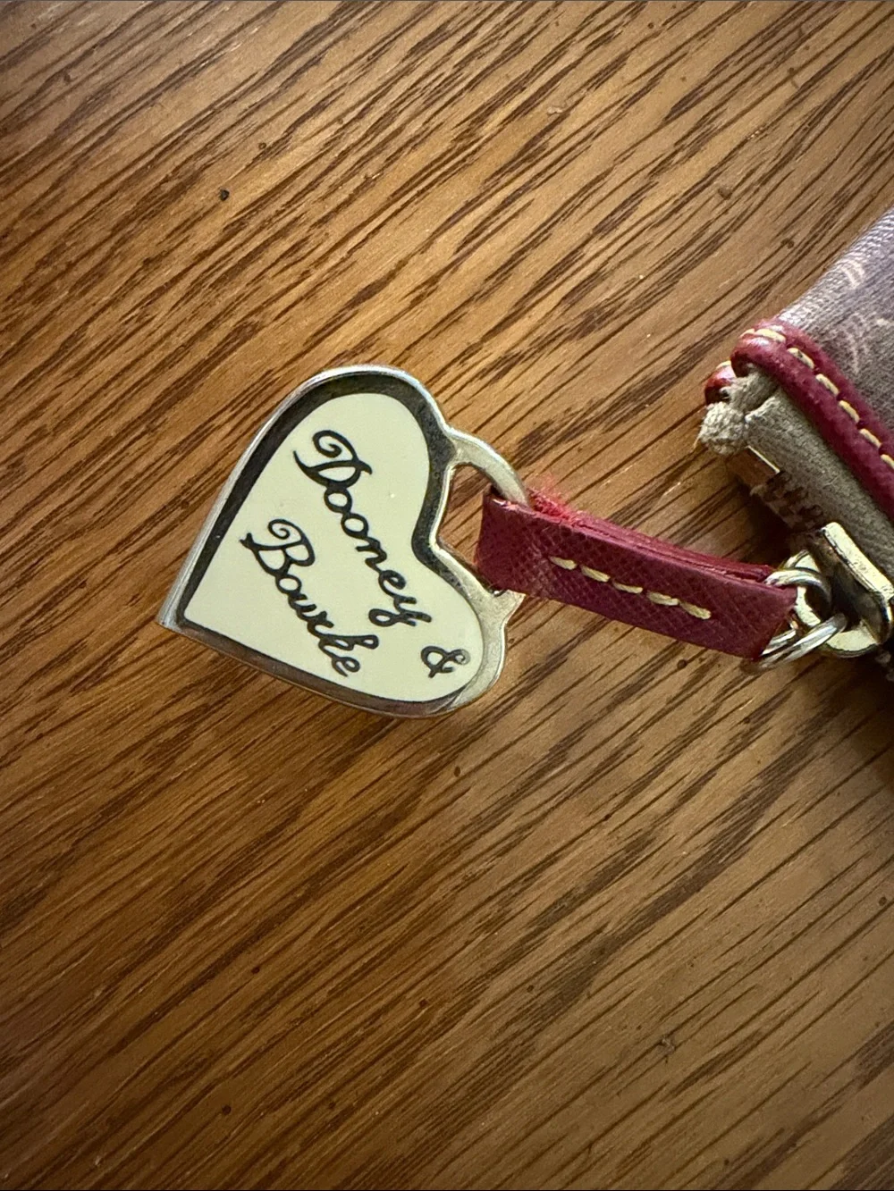 Dooney & Bourke Plum Multicolor Logo Zip Wristlet with Heart Charm